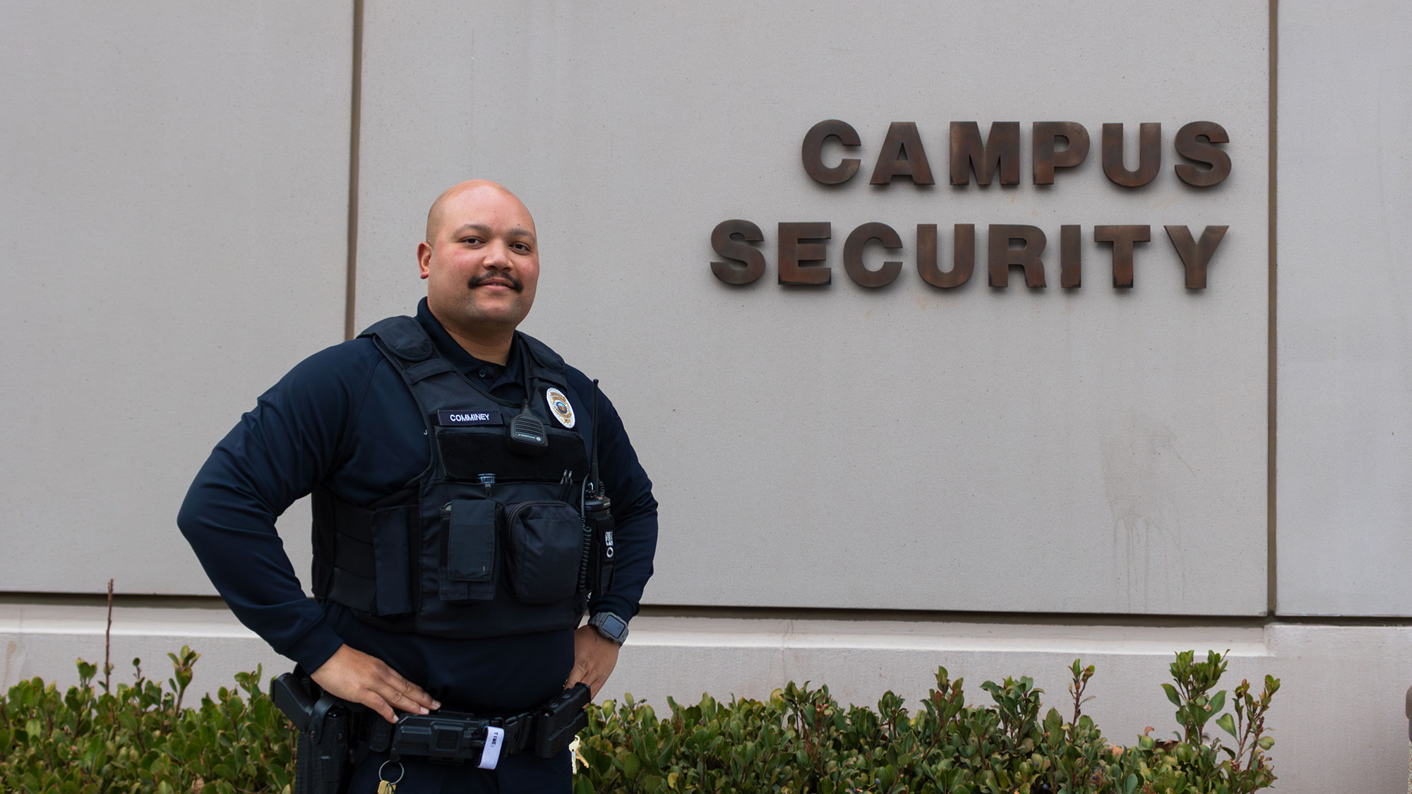 campus safety officer in front of safety office