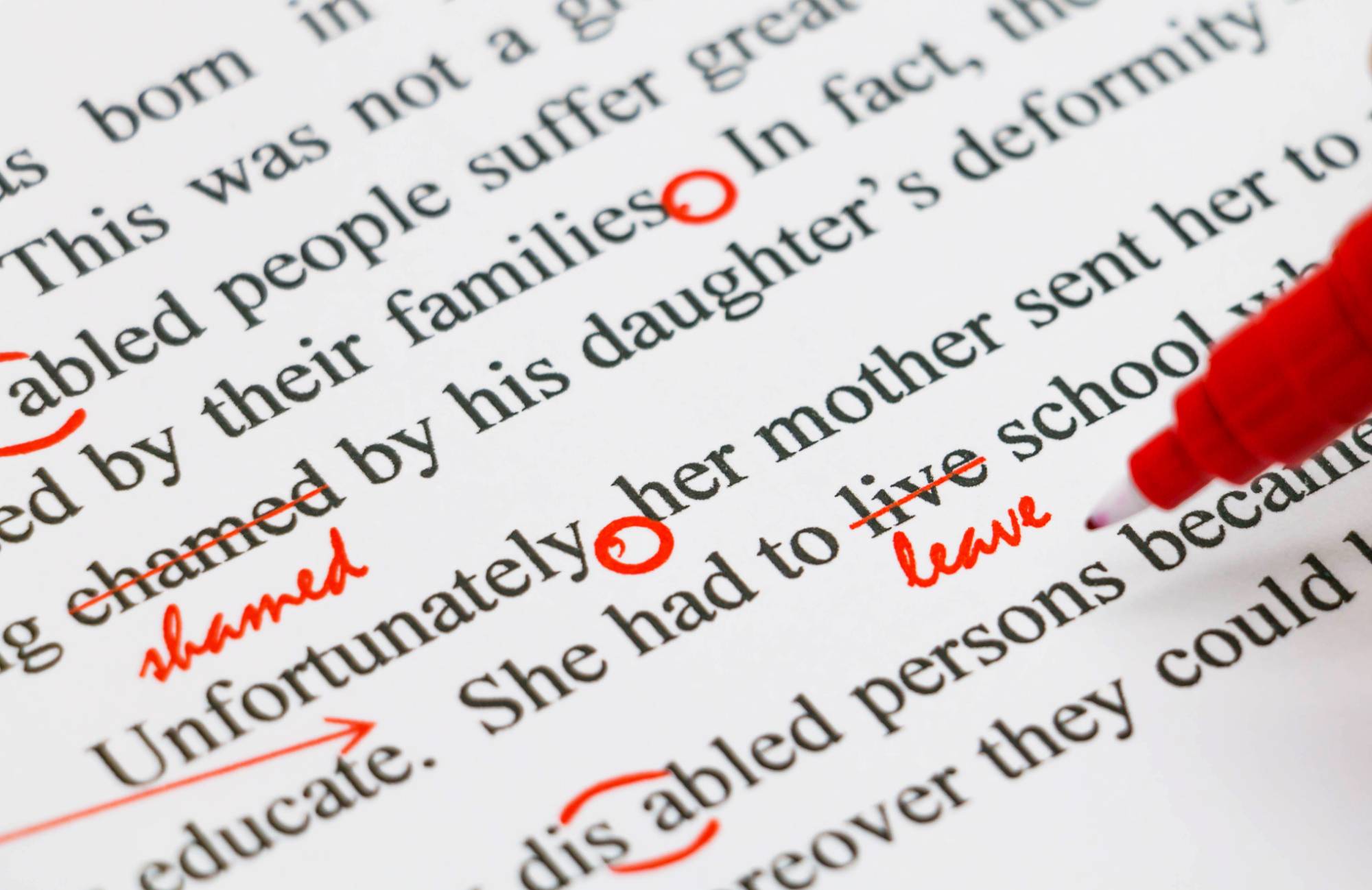 red pen proofreading text