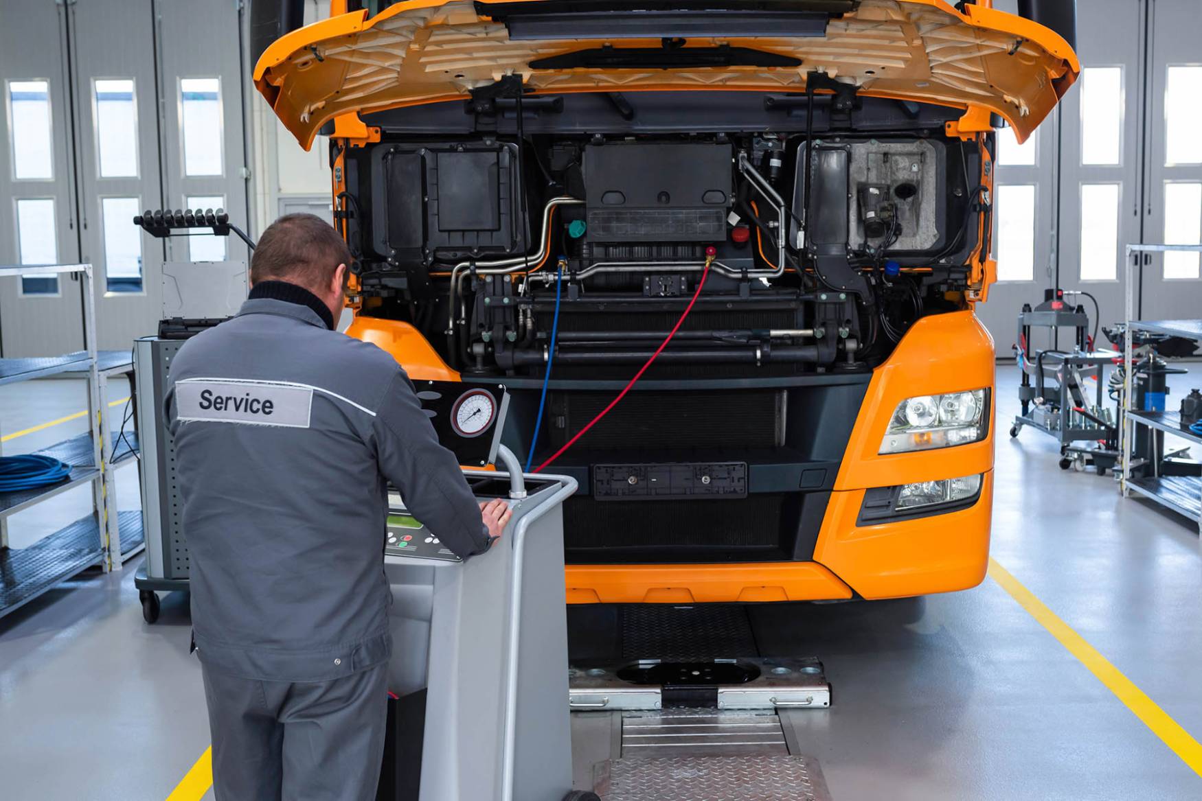 diesel technician working on a truck