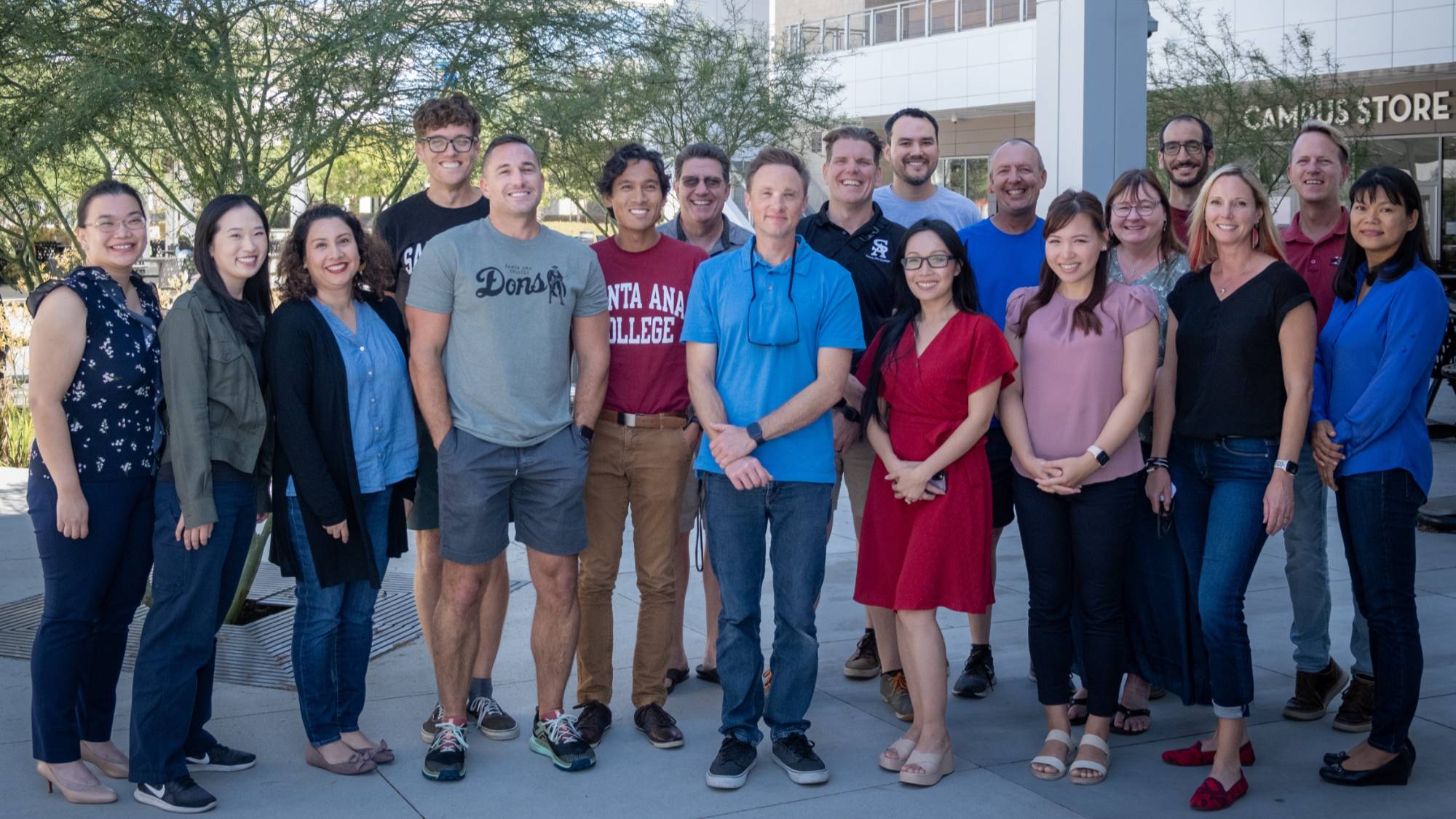 mathematics department faculty smiling in a group