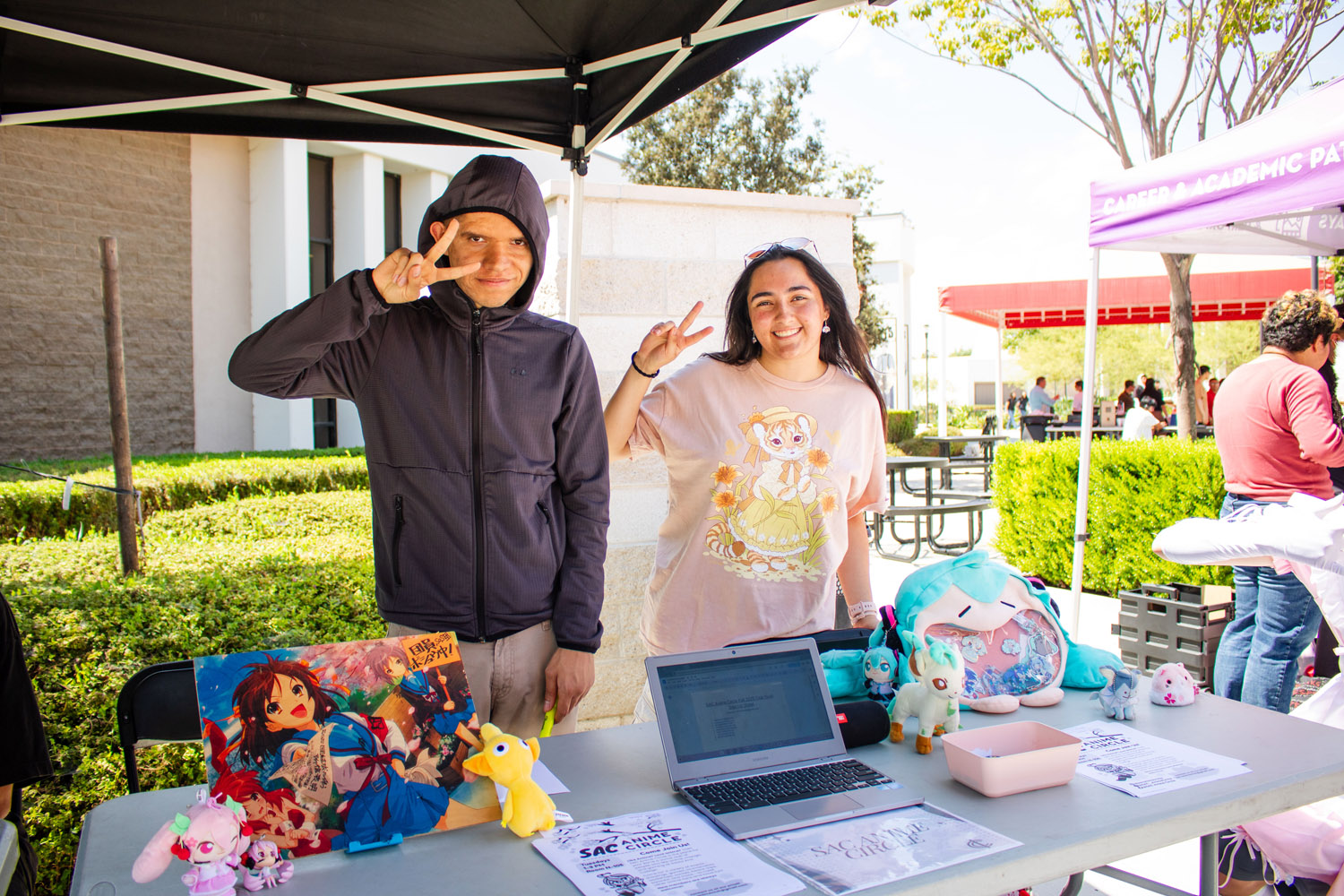 two students running a table at ICC Club rush