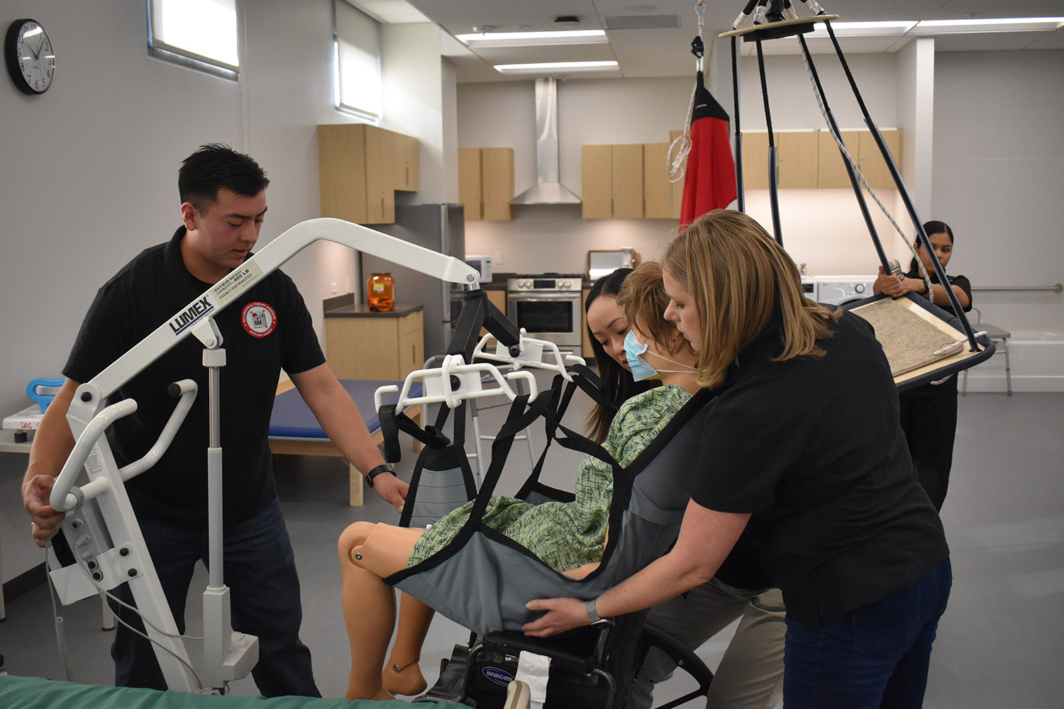 Occupational Studies students practice skills in Health Sciences Building lab