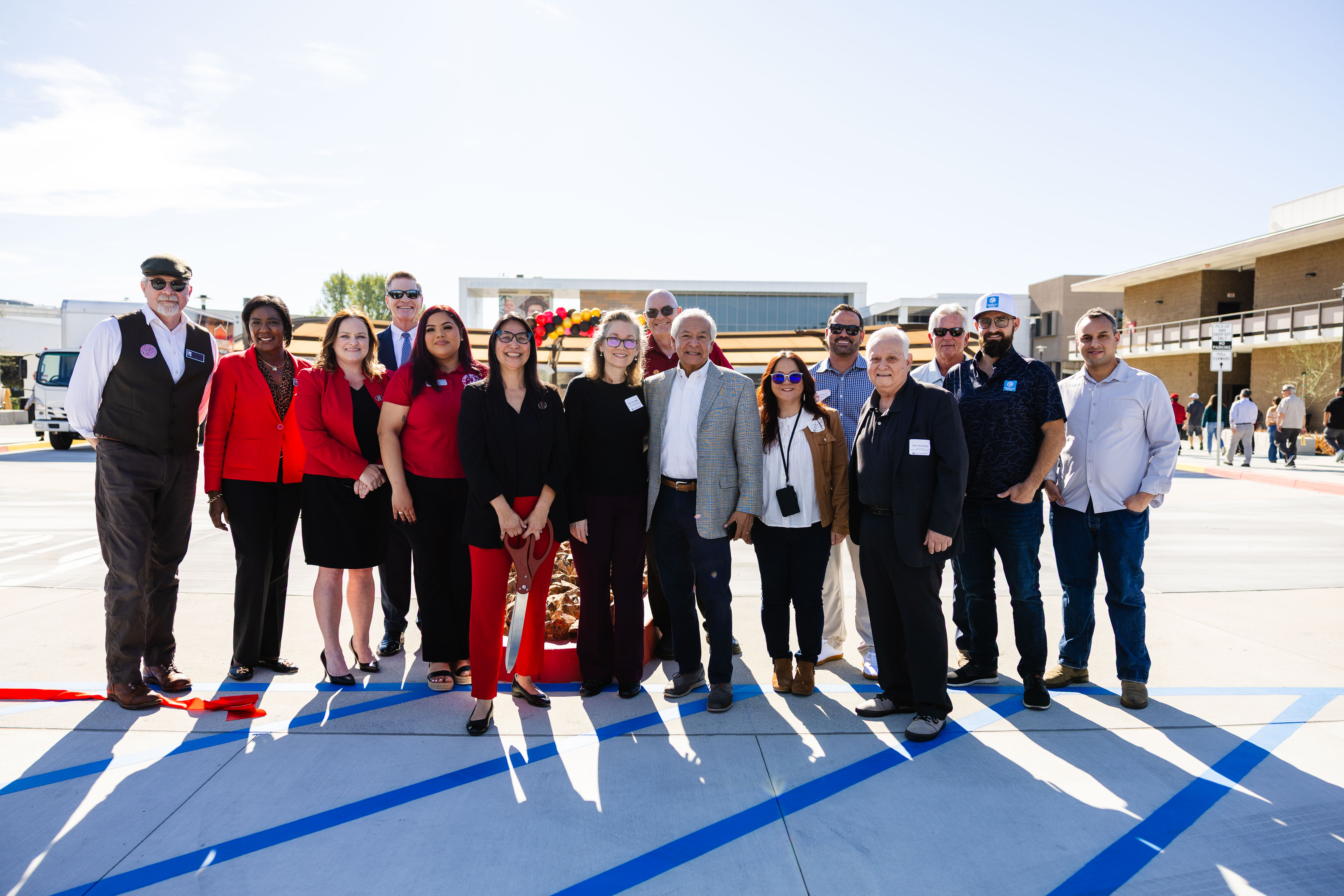 SAC president, VPs, and VIPs pose in front of the new entrance